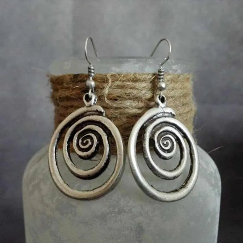 Silver geometric spiral distressed earrings with vintage ethnic style design