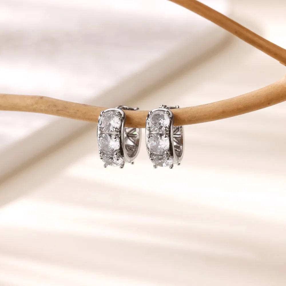 Silver-tone U-shaped women's ear clips with zircon stone detailing and clip-on back