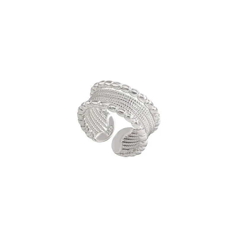 Adjustable geometric copper ring with woven twisted multilayer design