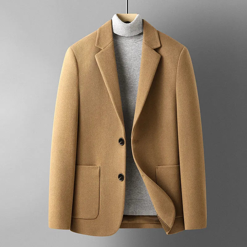 Men's slim fit wool suit jacket in grey on a hanger