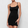Black sleeveless sling style sheath dress with a slim fit and short mini skirt length.
