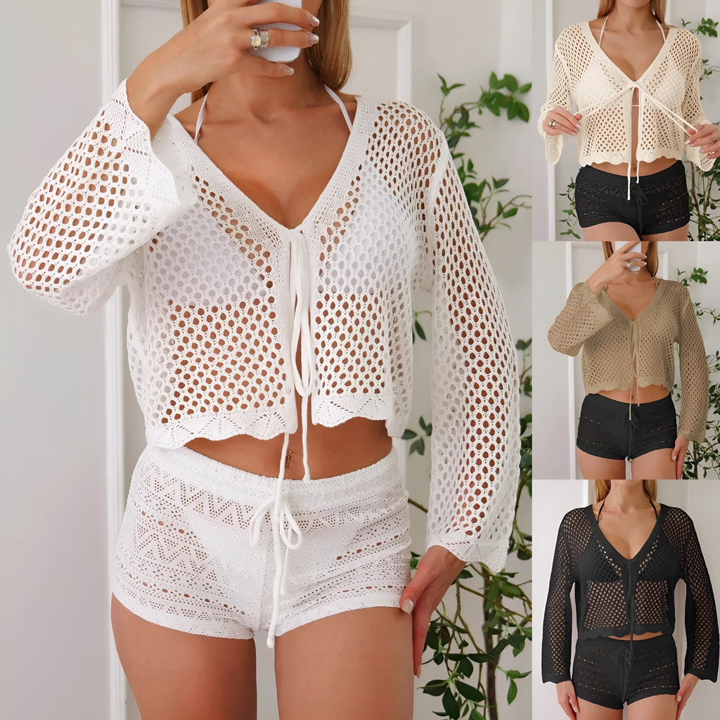 Short apricot hollow woven women's cardigan blouse with bell sleeves on a hanger