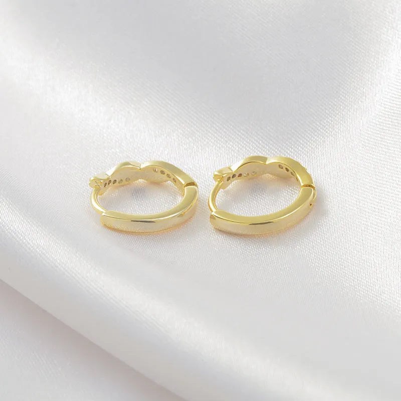 Geometric hemp rope interwoven earclip earrings in gold colour with diamond treatment surface