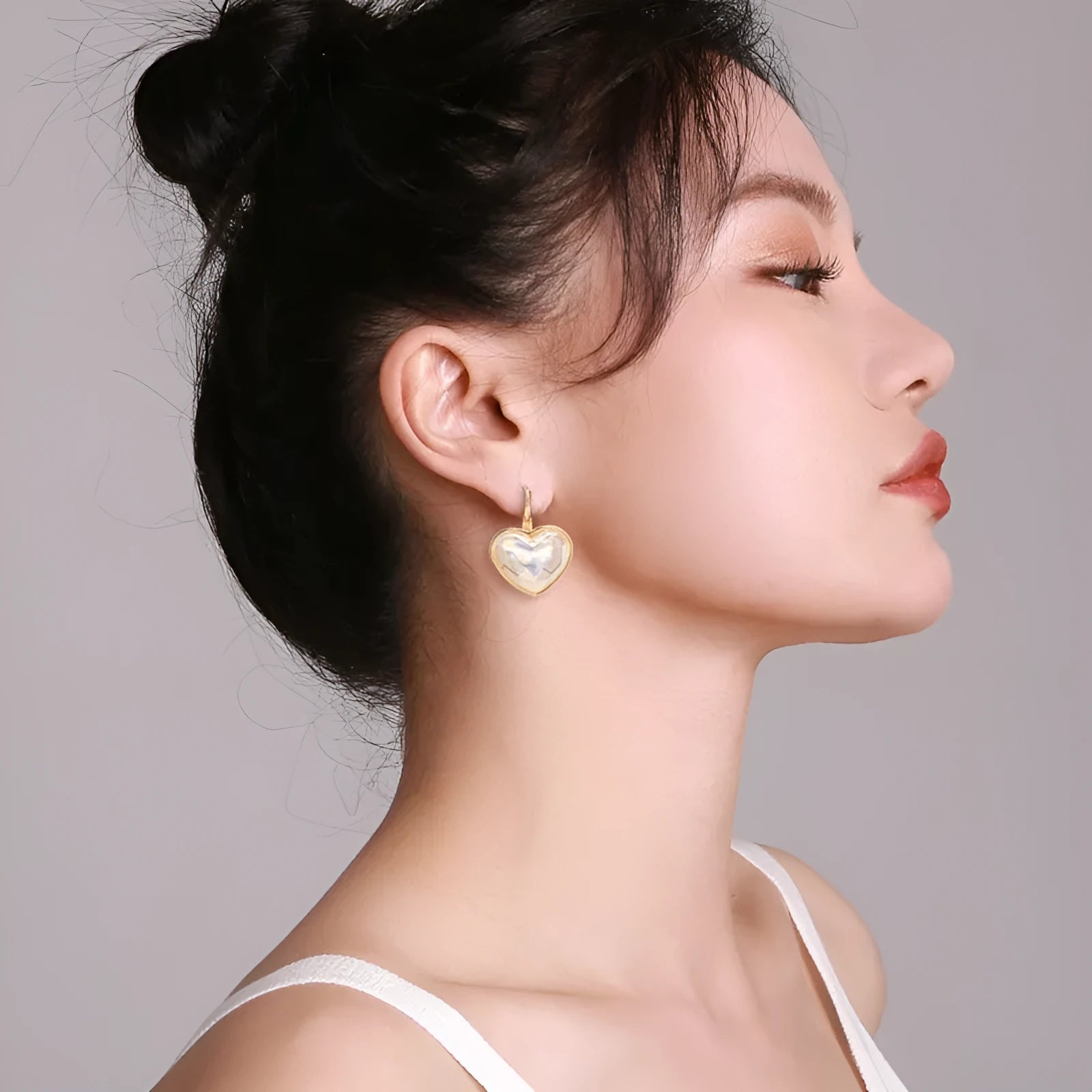 Gold alloy women's ear clip with summer love design and clip-on mechanism