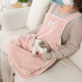 Cloth cat grooming apron in light blue with ventilation holes for breathability during petting