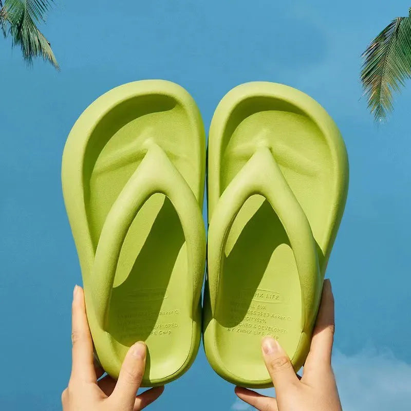 Women's thick-soled EVA flip-flops with a bow detail on the strap, shown in various colours.