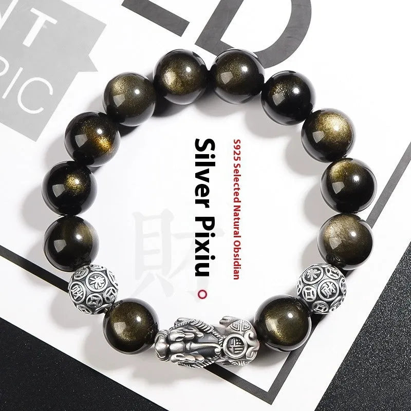 Men's geometric bracelet with a black obsidian bead and sterling silver clasp on a leather cord.