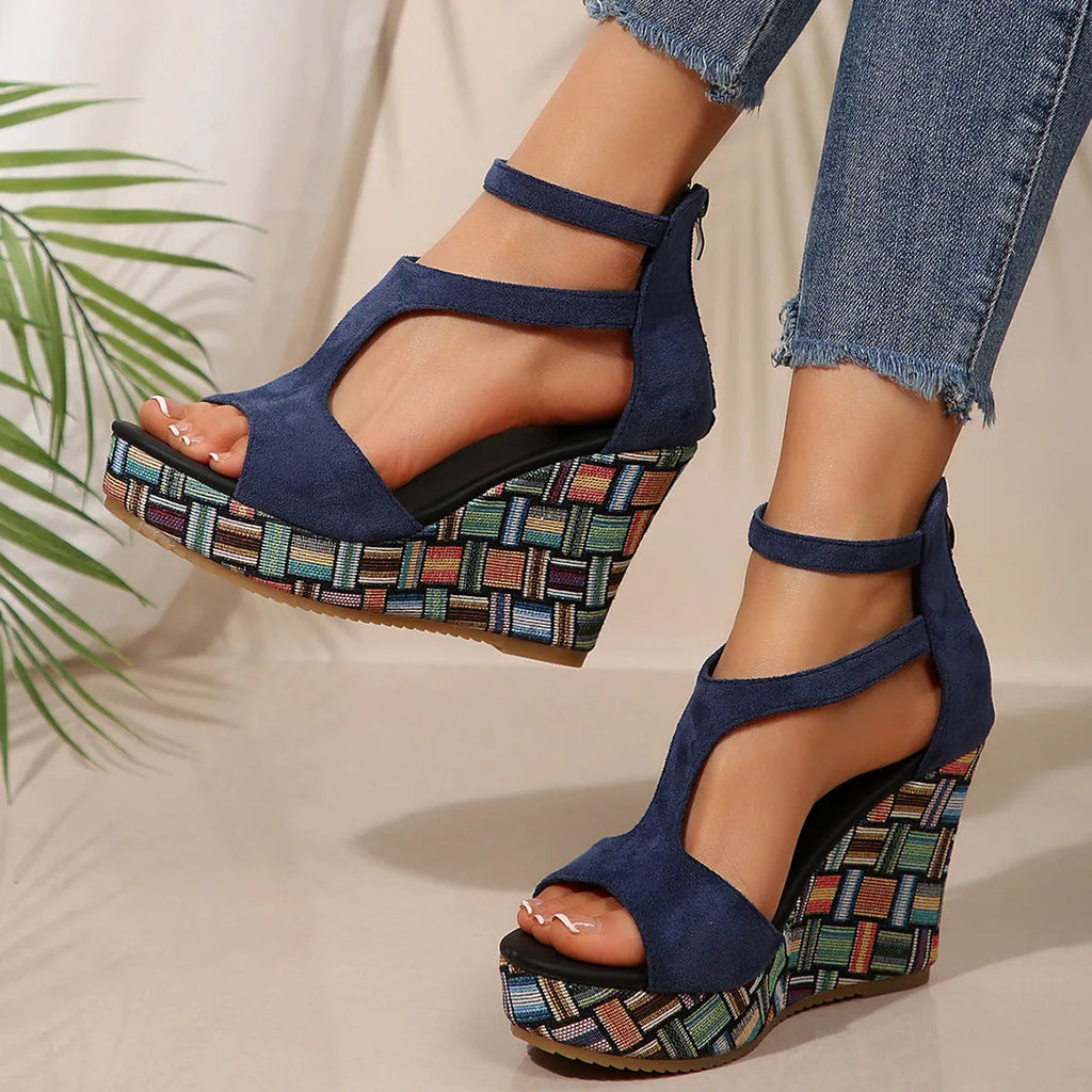 Women's cream white ankle-strap buckle sandals with thick rubber sole and cloth upper.