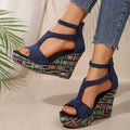 Women's cream white ankle-strap buckle sandals with thick rubber sole and cloth upper.