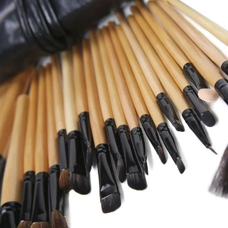 24 professional makeup brushes with wooden handles in a gift bag including eyebrow, foundation and powder brushes