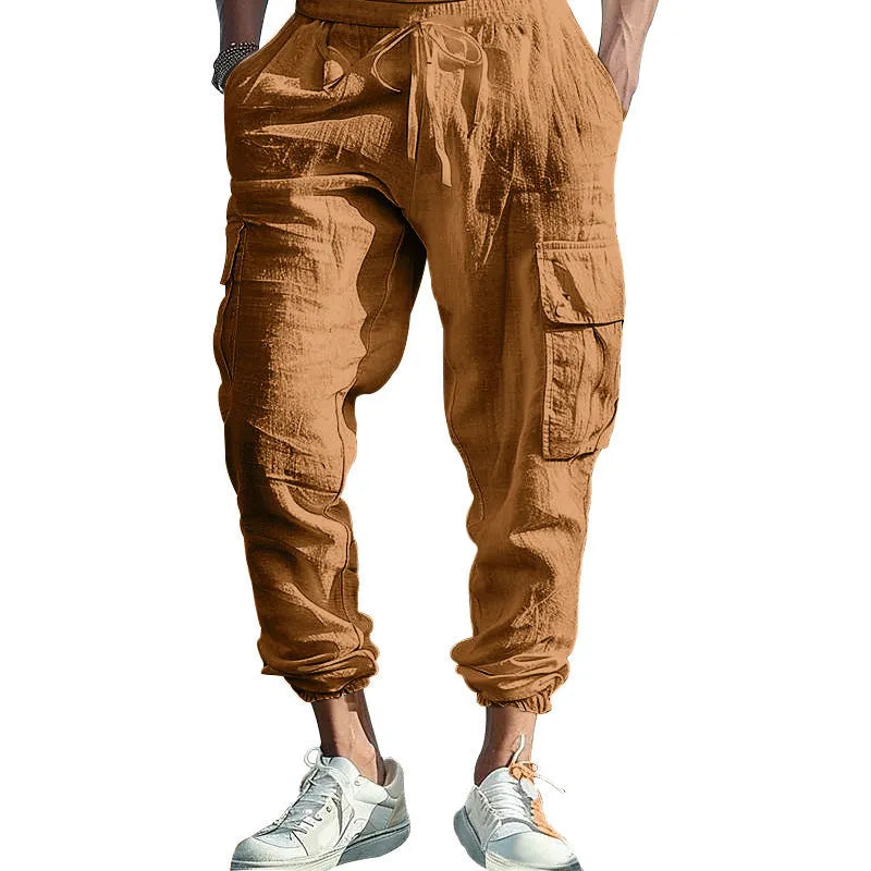 Men's ankle-tied linen trousers in Army Green colour showing multi-pocket design and drawstring waist