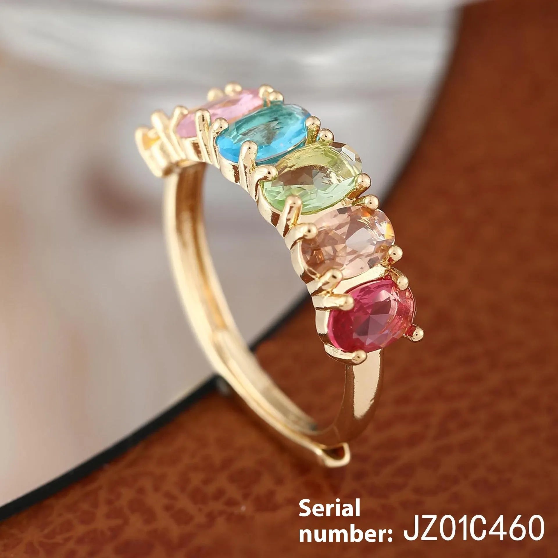 Gold-coloured adjustable women's ring with zircon stone in simple retro design
