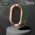 Desktop electric ceramic heater in black on a wooden desk
