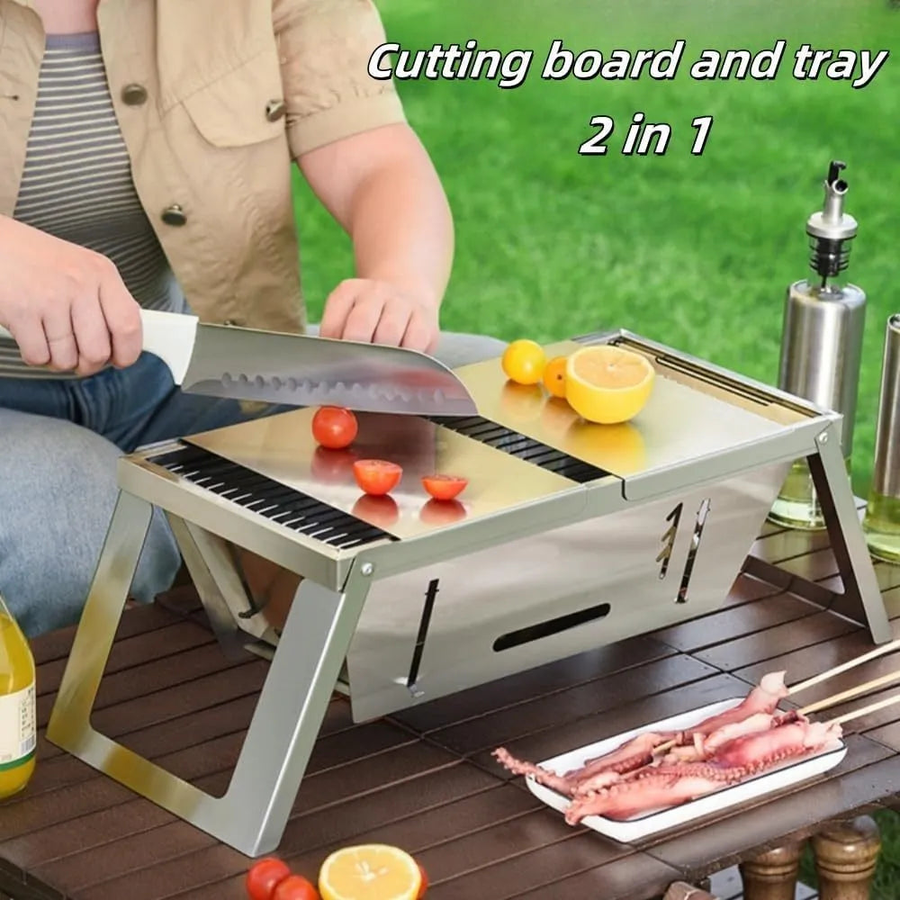 Small foldable portable charcoal grill for outdoor cooking.