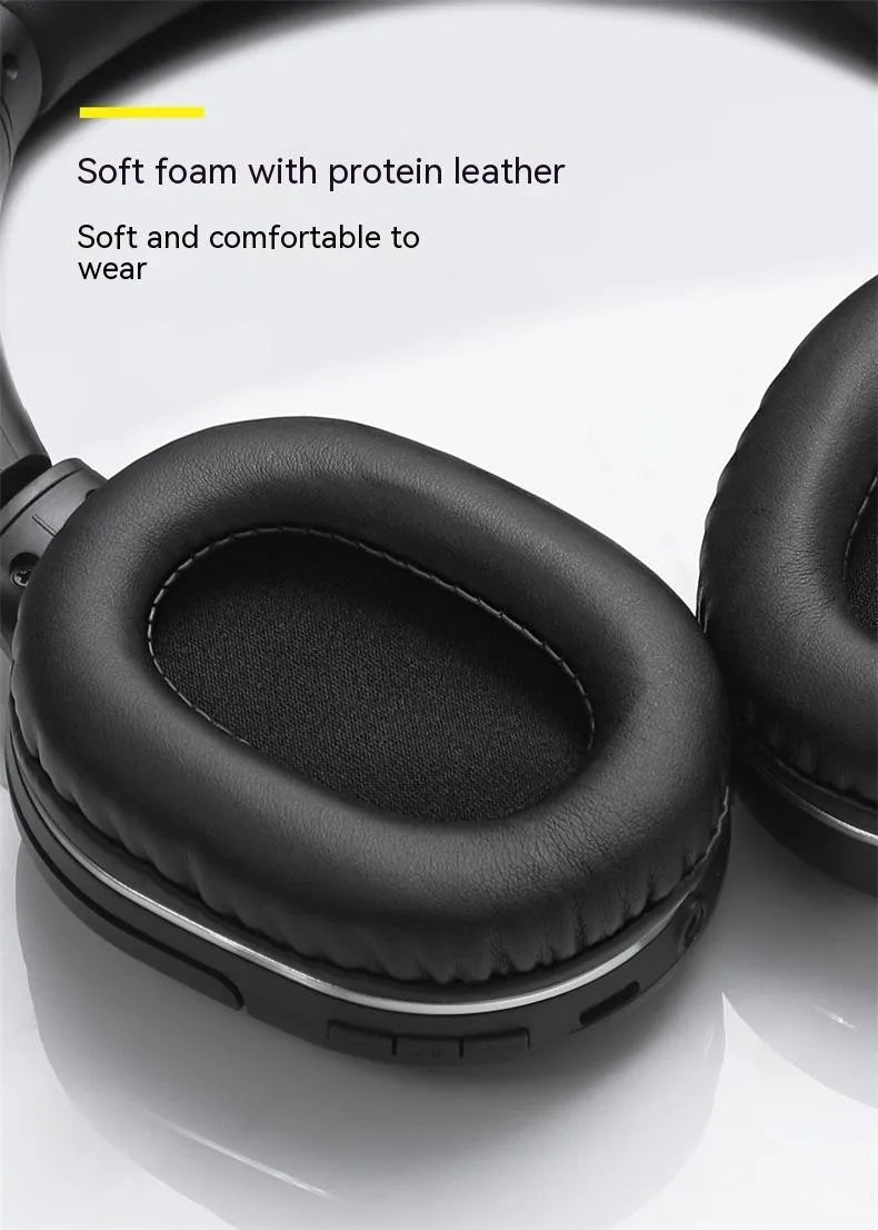 Black and white wireless Bluetooth sports gaming headset with over-ear design.