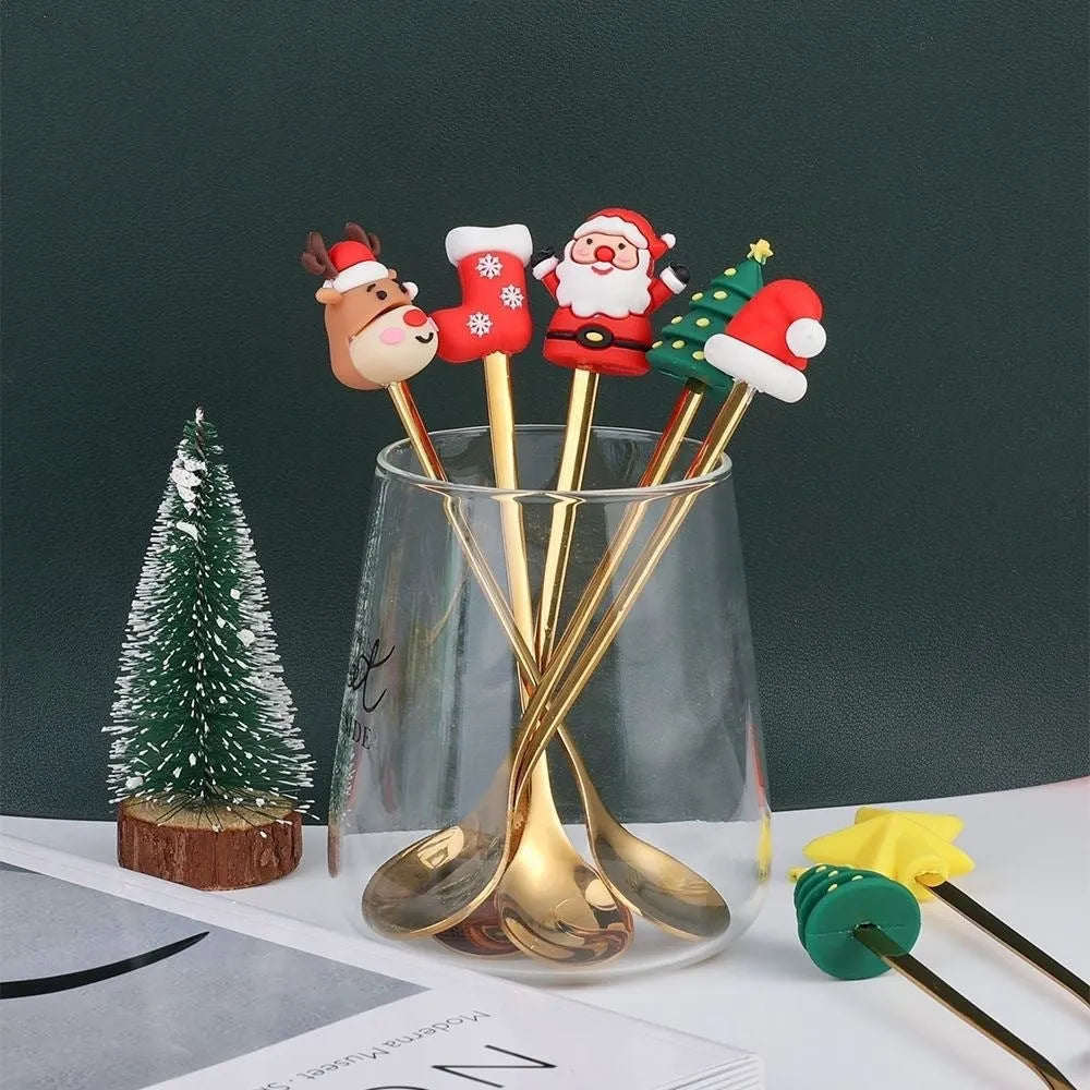 Red stainless steel Christmas spoon and fork set with snowman and Christmas tree designs