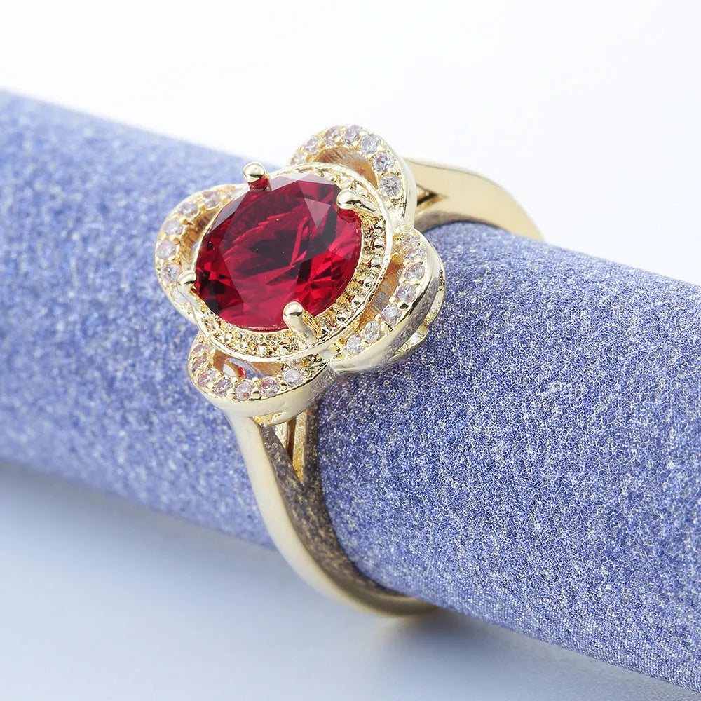 Copper fruit-shaped ring with inlaid zircon stone, shown in colour 10-6-1395.