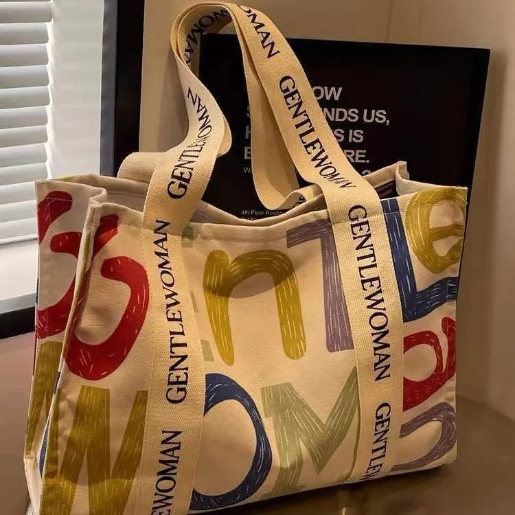 Women's canvas tote shoulder bag with large capacity and printed design options