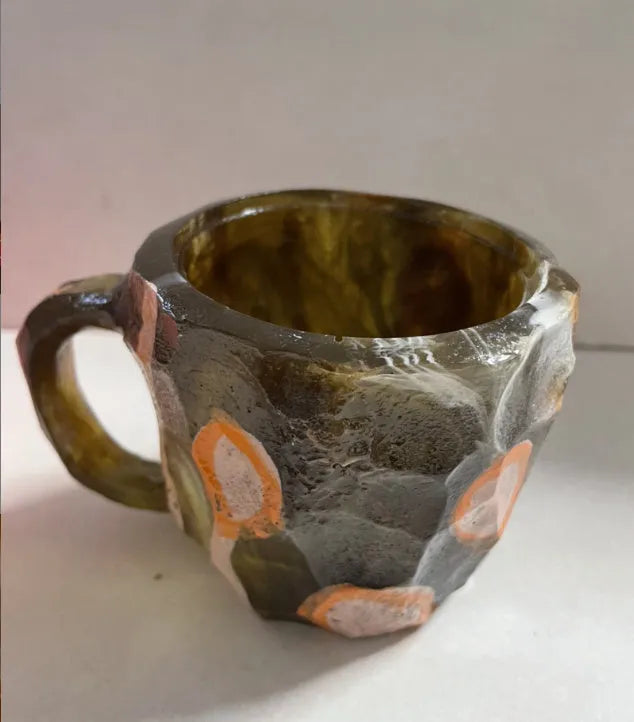 Purple resin mineral crystal coffee mug with handle showing 3D texture and 10cm height