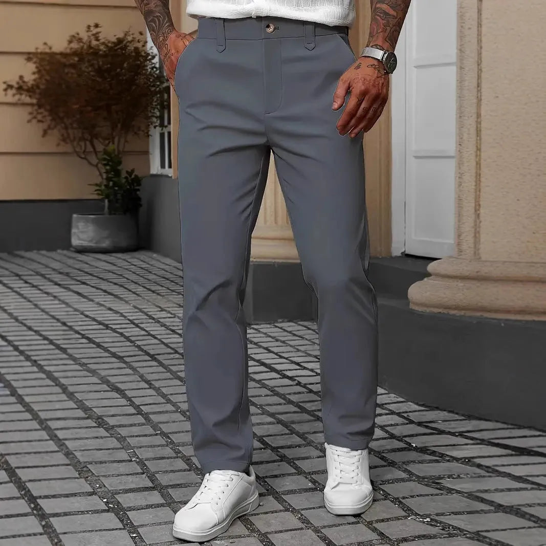 Men's straight leg business casual trousers in solid colours on a hanger.