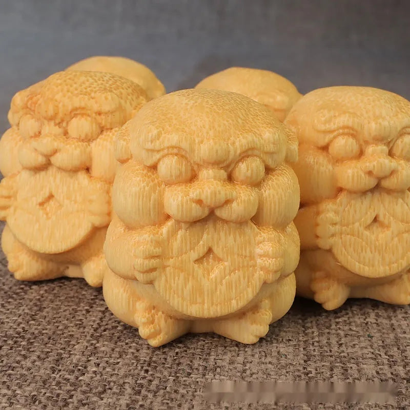 Solid bamboo carving ornament with Take Money design, 4.5cm tall, on a wooden surface.