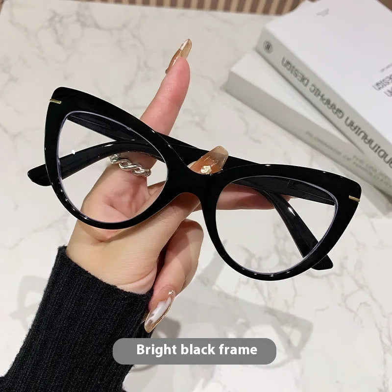 Women's large cat's eye frame glasses with dragon and phoenix decorations, shown in various colour options.