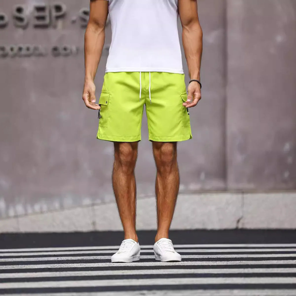 Men's loose-fitting army green workwear shorts made from cool silk cotton fabric.