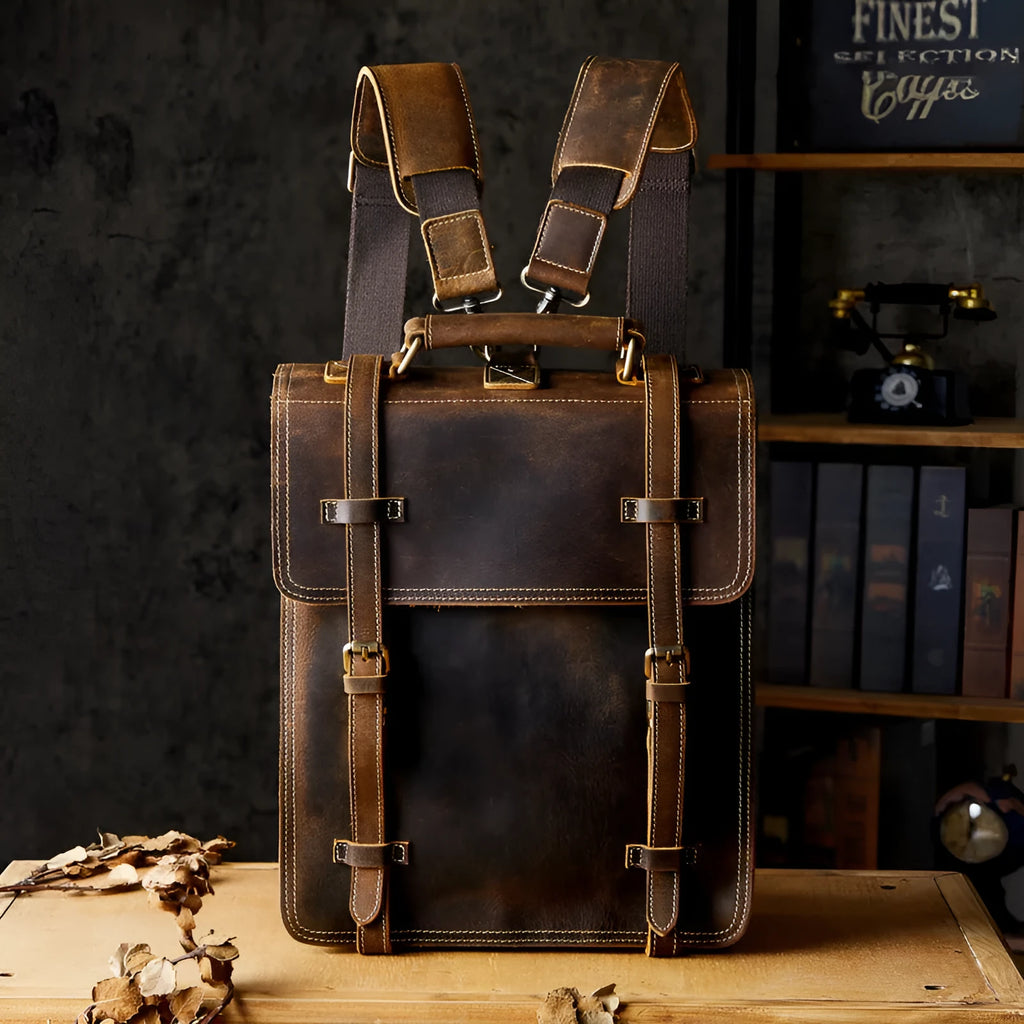 Brown first layer cowhide leather backpack with curved straps and dacron lining, 40x30x10cm