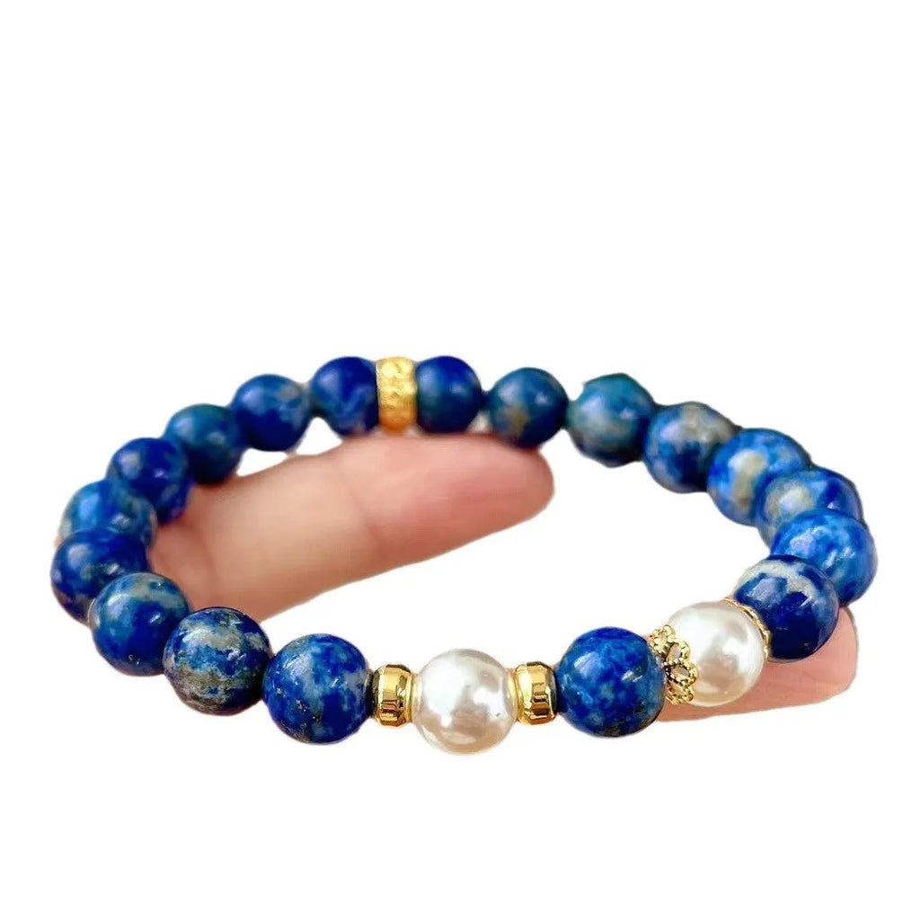 Chinese style lapis lazuli bracelet with green gold stone elements and artistic retro design