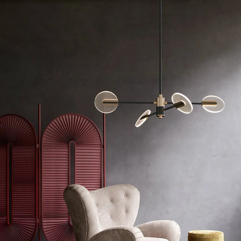 Nordic style iron LED chandelier with multiple acrylic shades hanging from a central frame.