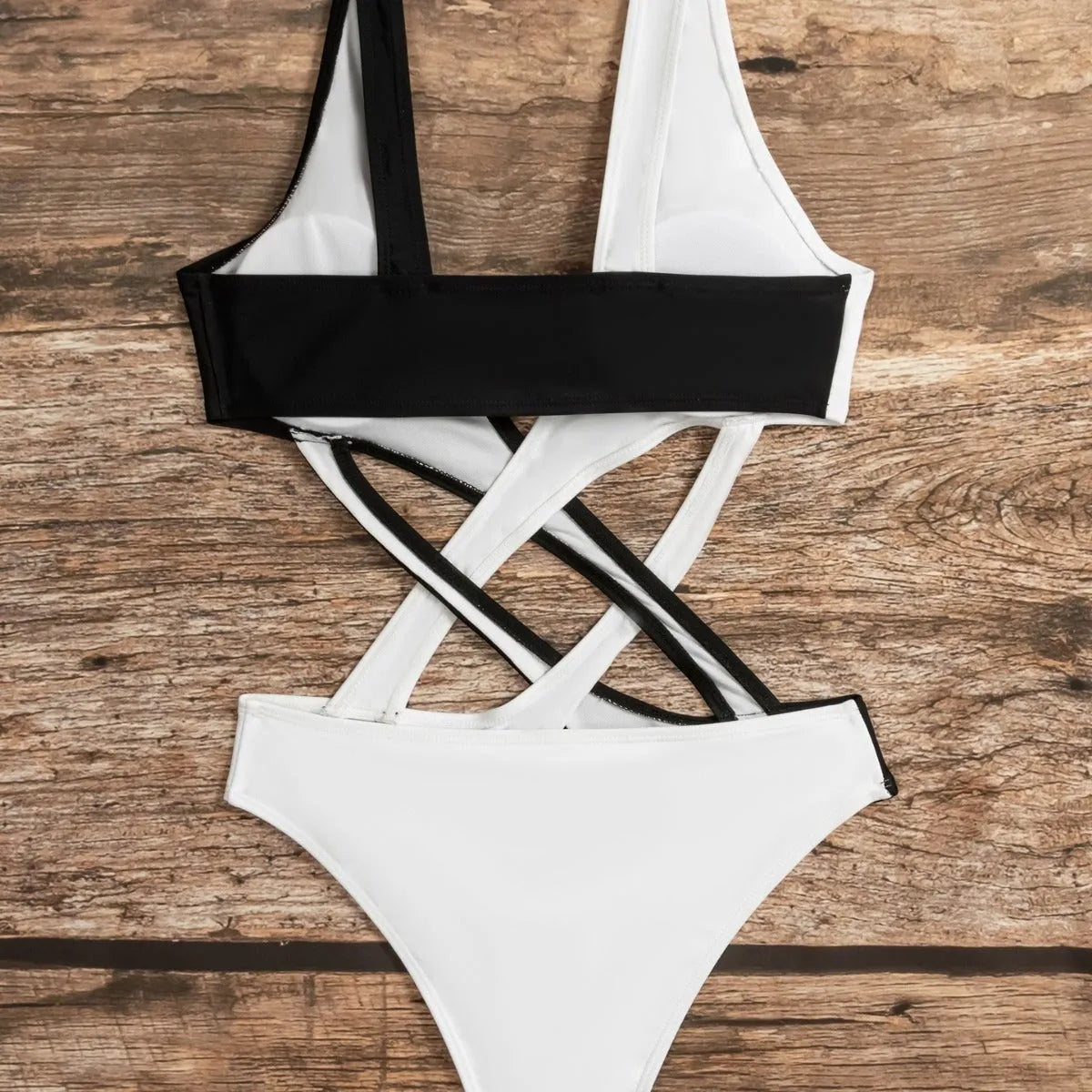 White women's one-piece swimsuit with colour block design and hollow out pattern