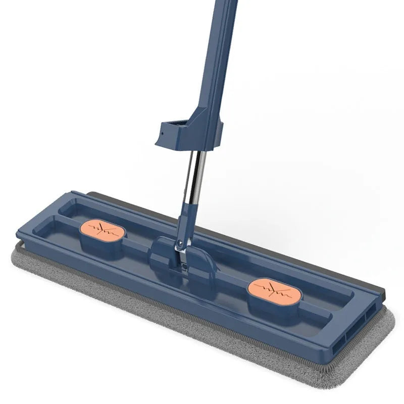 Large flat mop with long stainless steel handle and blue fine fibre cloth on hard floor