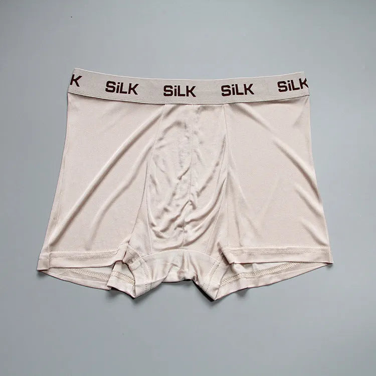 Men's loose fit silk shorts in navy blue with mid-waist design