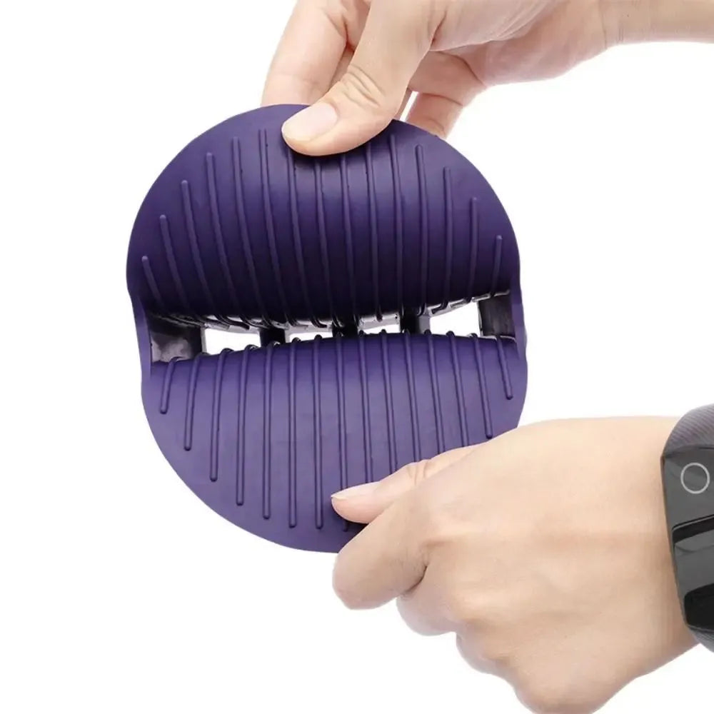 Purple pet shampoo brush with silicone bristles for dog and cat grooming during bathing