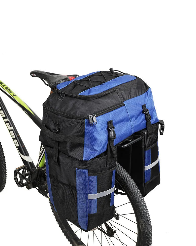 Rhinoceros brand green 70 litre bicycle rear frame storage bag mounted on a bike for touring.