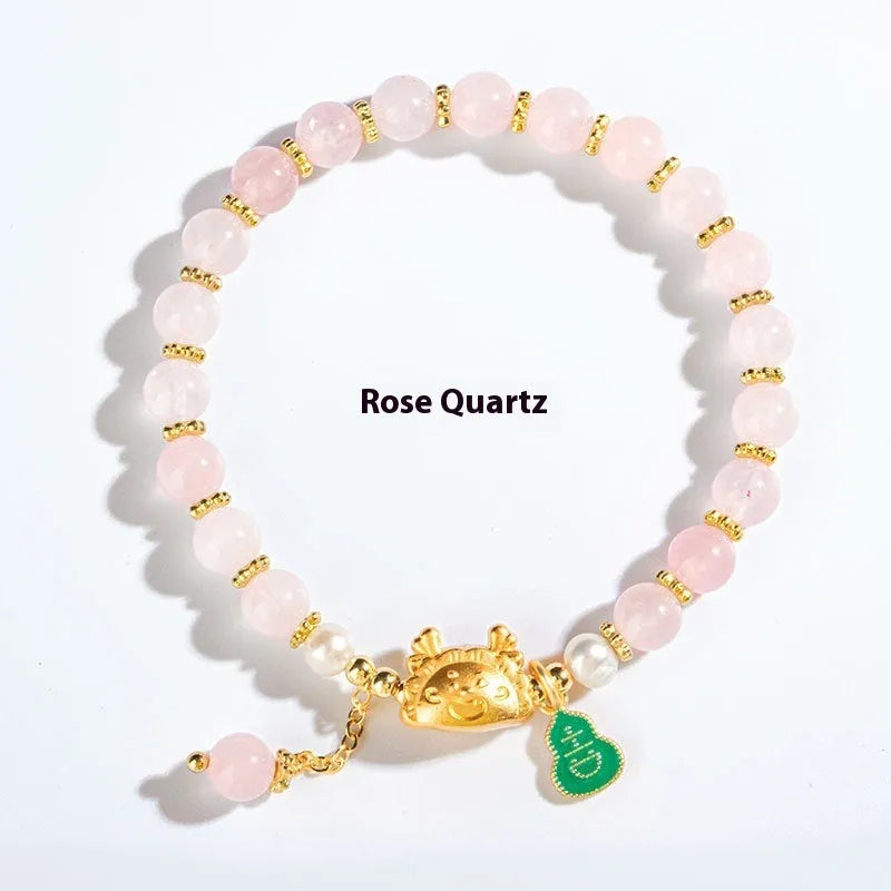 Handmade dragon zodiac bracelet with 8mm diamond-cut agate or crystal beads in one of five colour options.