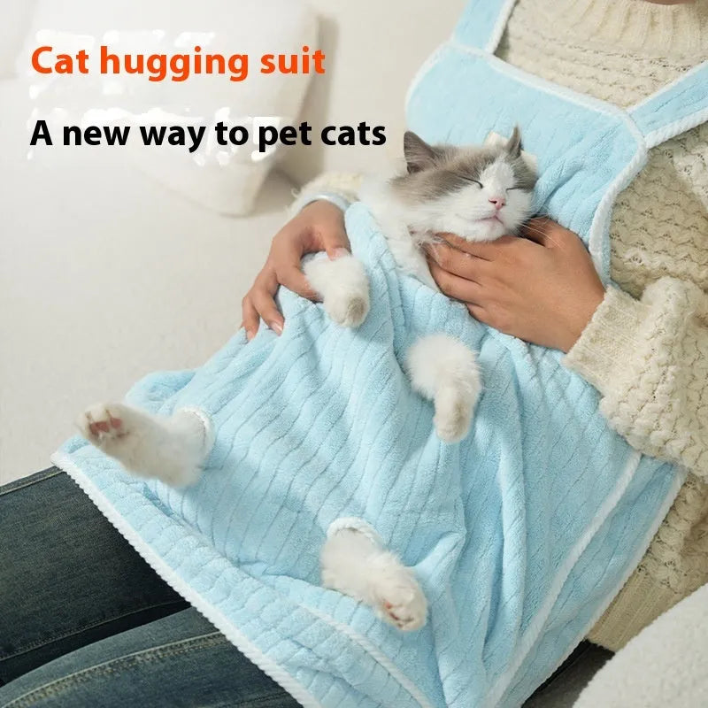 Cloth cat grooming apron in light blue with ventilation holes for breathability during petting