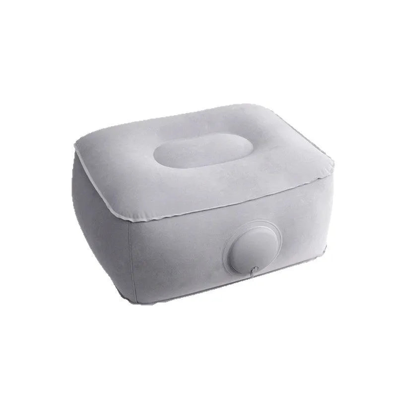 Grey inflatable seat cushion with flocked texture, shown inflated on a chair and deflated for portability.