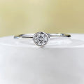 Minimalist silver crown ring with linear detailing in electroplated R962 platinum or gold finish