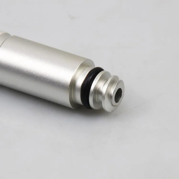 Silver metal VAS6262-9 transmission refuelling joint tool on a workshop bench.