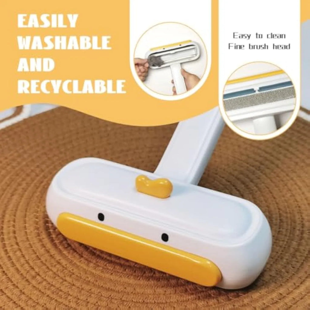 White portable pet hair remover with yellow duck design and polyester bristles.