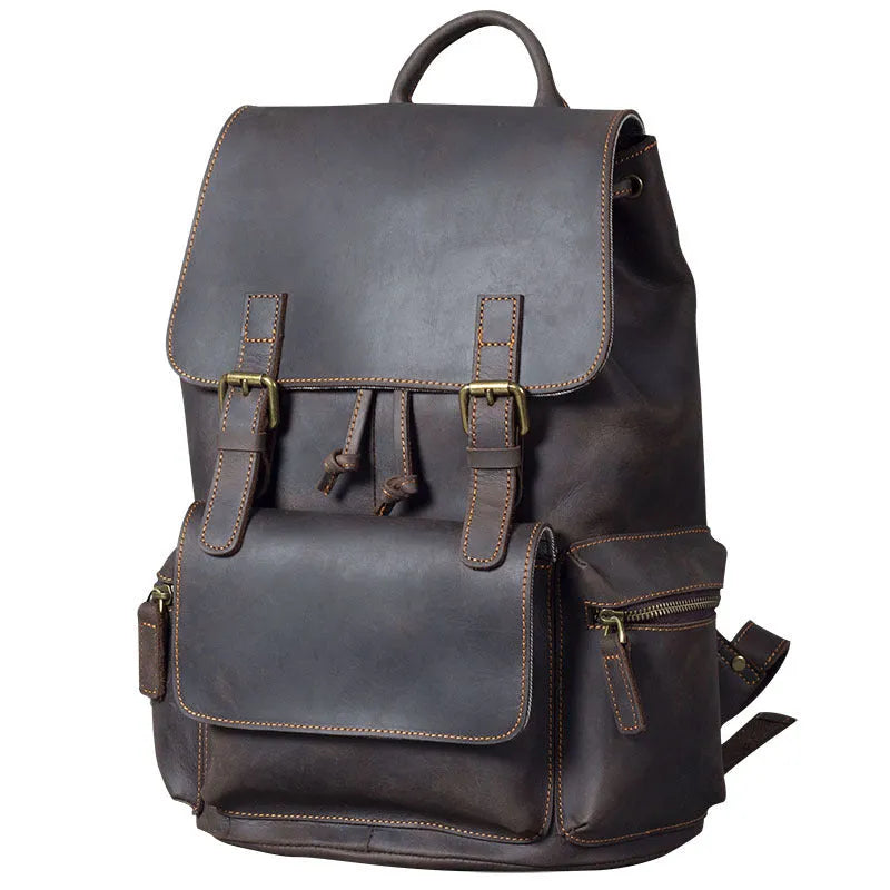 Retro brown leather backpack with double shoulder straps and vintage styling