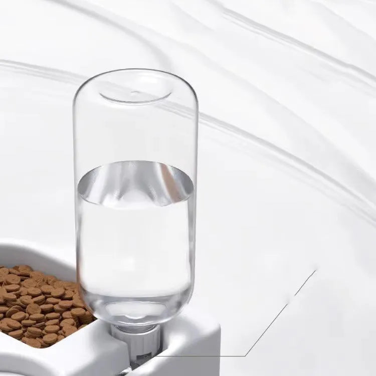 White pet water fountain for cats and dogs with stainless steel drinking top.