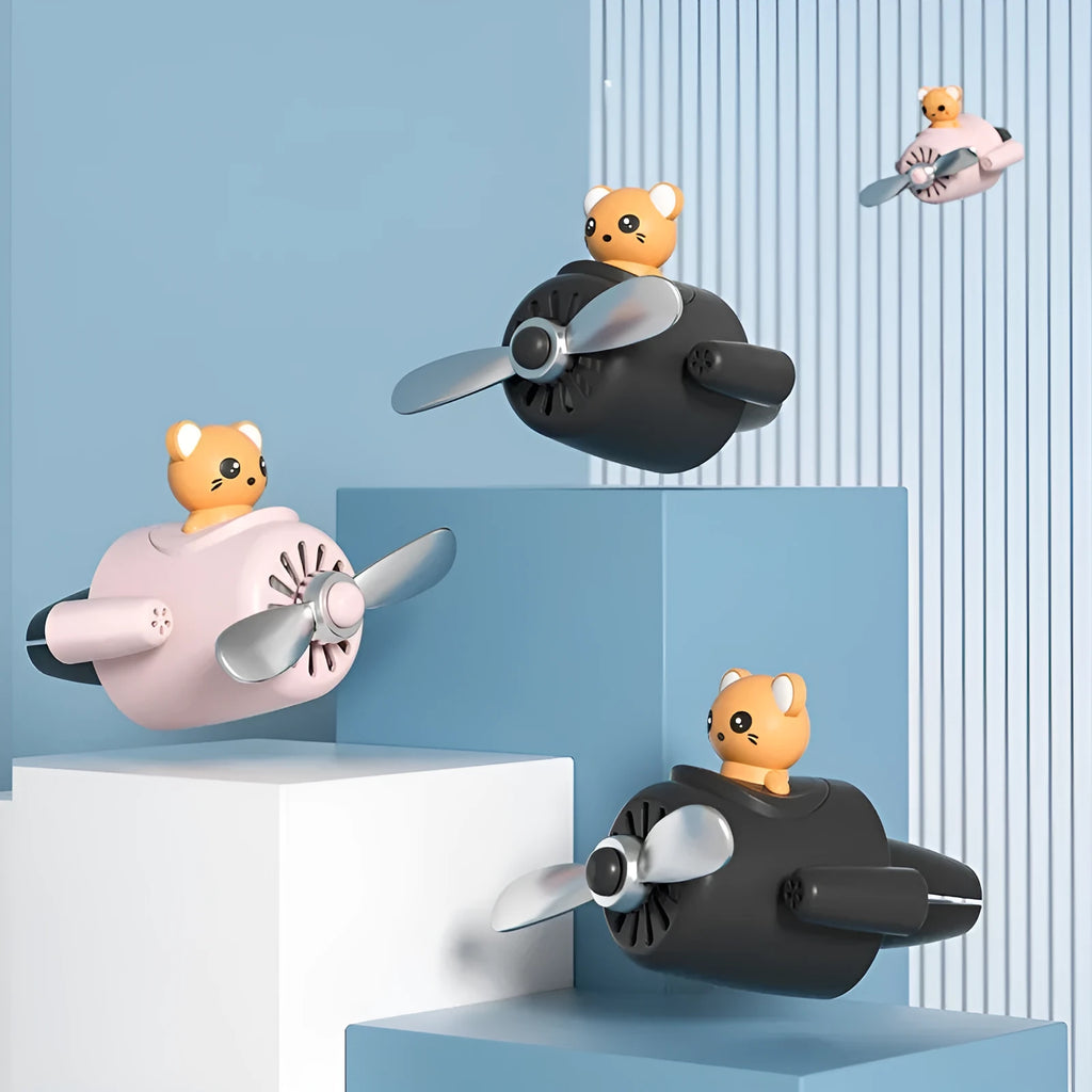 Cartoon aeroplane-shaped car air vent clip-on aromatherapy diffuser in chosen colour with fragrance pads.