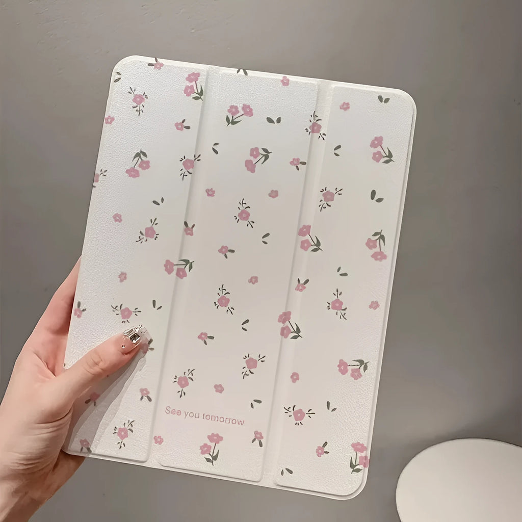 Transparent floral patterned iPad case with tri-fold magnetic stand open