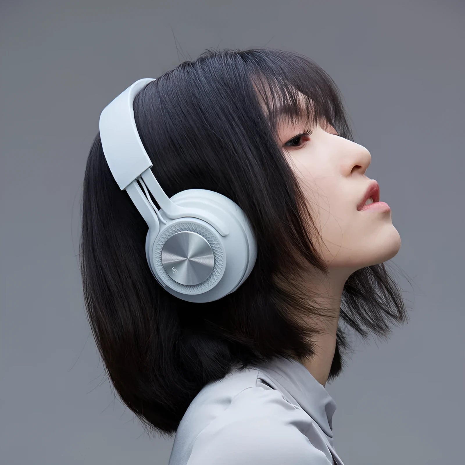 Red sports Bluetooth headset showing power display, for wireless music and calls