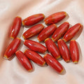 Assortment of ceramic bullet beads in flower glaze colours for jewellery making