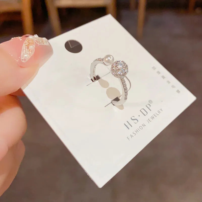Open-end women's ring with round zircon stones and real gold plating in gold and silver colour options