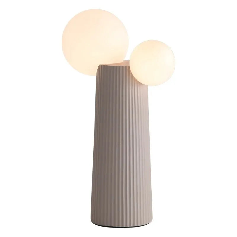 Modern minimalist cactus bedside lamp in milk coffee colour, resin and PE lampshade, 21cm diameter 40cm height, on bedside table