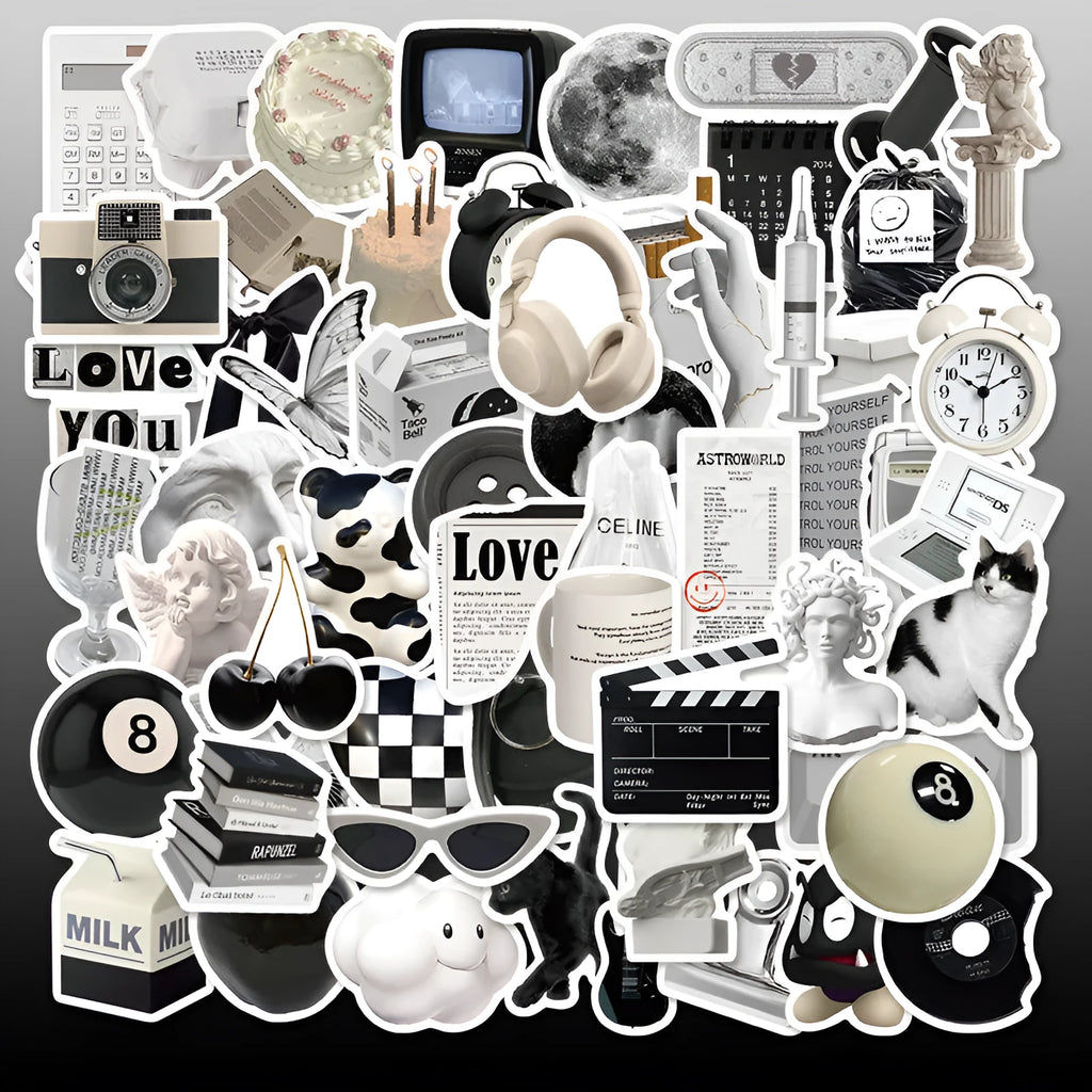 Assortment of black and white vinyl stickers featuring coffee cups and abstract designs for laptops and phones.